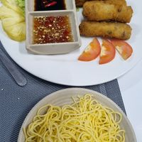 Spring rolls was served with noodles on the side at An Nhi Chay in Hue