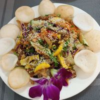 Mixed salad with orchid flowers 🌺 at An Nhi Chay in Hue