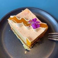 "STONEWAY SUMMER":
Orange olive oil sponge, apricot jam, almond-praline buttercream filling, li hing mui buttercream frosting. at Paper Cake Shop in Seattle