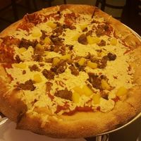 Daiya cheese, pineapple and tempeh. Delicious.  at Mellow Mushroom in Tallahassee