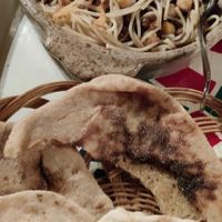 Koshuri and Egyptian bread at Abou El Sid Restaurant in Cairo