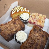 Orange pistachio olive oil cake, strawberry crumb cake, chocolate chip banana bread, and two mini vanilla frosted chocolate cupcakes. All incredible! at Maple & Maine Pastry Kitchen in Boston