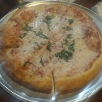 Add basil at Zio's Pizzeria  in Omaha