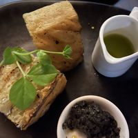 Grilled sourdough and tapenade   at Osprey's Restaurant in Oak Beach