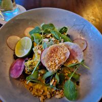 Pickled eggplant, fried tofu, turmeric peanut sauce, lentil dressing at Osprey's Restaurant in Oak Beach