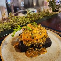 Grilled tofu on hot stones at Tim's Sa Pa Kitchen in Lao Cai