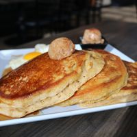 🥞Pumpkin Spice Pancakes pan fried pumpkin purée hotcakes with a crisp golden brown exterior. Topped with pumpkin spice brown sugar butter drizzled with maple syrup at Sacy's in Brimley