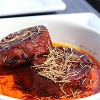 Beurre Rouge Filet 
100% plant-based topped with beurre rouge glaze (made from plant-butter and red wine). Served with plant-based mashed potatoes and vegetable based gravy  at Sacy's in Brimley