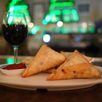 sambusa & wine  at Mesob Ethiopian Restaurant in Denver