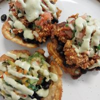 two tofu tostones & a mango salsa tostone (no cojita) at Roots Latin Grill in Springfield