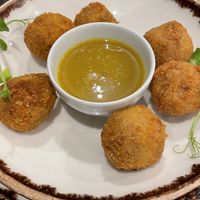 Croquettes “saucisse fumée” très bon !!!   at Veganapati in Lisbon