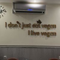 Wall decor that always makes vegans smile!  at Veganapati in Lisbon
