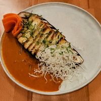 Grilled tofu, eggplant, pickled carrot, curry sauce. The flavours together were incredible.  at St. Elsewhere in Ottawa