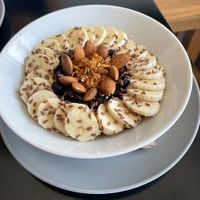Oatmeal with cinnamon, bananas, almonds, and raisins    at Sano Bistro in Progreso