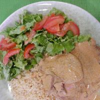 Seitan with mustard sauce, bulgur wheat and salad at SHANTI - Cantina Vegan in Marinha Grande