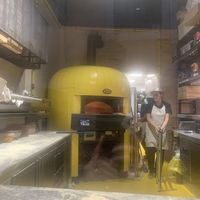 Pizza oven thru front windoww  at Bartali Pizza Co in Girona