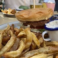 Beyond burger with brioche bun, with vegan tartar sauce (the white sauce). The one we liked most. On Mondays the fries are free.   at Skapto  in Sofia