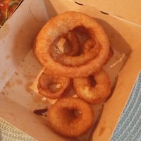 "On & On (ion Rings)" with separate BBQ Dip at Vegan Pirates by CloudEatery in Berlin