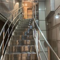 Go up here  at Tokyo Vegan Ramen Center in Tokyo