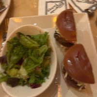 Impossible burger with side of green salad at The Cheesecake Factory in Gainesville