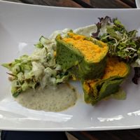 Green Crepes with carrot filling at Die Weinstube Nachhaltig Geniessen in Zeltingen