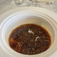 Clear tomato soup with orange & fried rice noodles  at Die Weinstube Nachhaltig Geniessen in Zeltingen