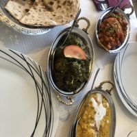 Vegan roti, chana masala, sag aloo and vegetable korma. All delicious  at Saffron Indian Kitchen in Praia Da Luz
