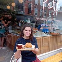 Happy friend sitting in the front of the bakery 😍 at Petit by Sam in The Hague