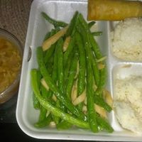 Combination platter to-go: Vegan egg roll, hot and sour soup, Vegan chicken and string bean, rice, and iced jasmine tea at Pepper Tree Veggie Cuisine in Houston