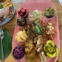 Vegan charcuterie board with homemade pickled things at UHMA in Santa Marta