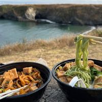 The interior is small and was packed with people, so we took our food down the street to the coast. Vegan garlic noodle bowl with fried tofu (l) and vegan ramen with fried tofu (r) at Gnar Bar in Mendocino