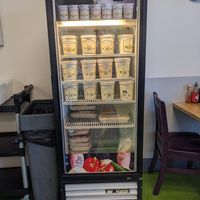 Case with soup and prepared foods (lasagna and tamales) at Great Full Gardens Cafe & Eatery in Reno