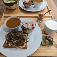 Mixed Mushroom Hummus Set with Amazake & Avocado Sauerkraut Set with Matcha latte. at The Kind  in Kyoto