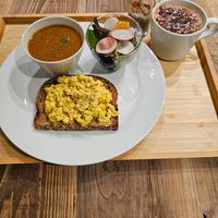 Plant based eggs, a lentil soup, fresh salad, apple and cinnamon chia pudding and a hot chocolate at The Kind  in Kyoto
