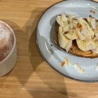 Hot oat chocolate with a piece of strawberry and banana toast  at The Kind  in Kyoto