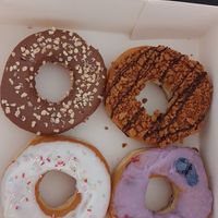 The vegan donuts in the pic are the white and the purple, there were also a yellow one (lemon) but I hate it on my way home so no pic :) at The Original American Donuts in Toulouse