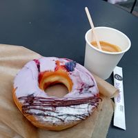 Violet frosting + cassis jam filling at The Original American Donuts in Toulouse