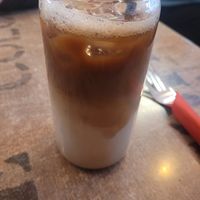 Iced Latte (Oat Milk) at L's Coffee & Bookshop in Conwy