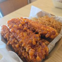 spicy soy chicken with a side of pancit at KOCO  in Virginia Beach