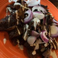 Chilaquiles con mole  at The Grain Cafe in Los Angeles