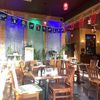 Booth Seating View - Full Decor Up w/California Sun Shining ✨  at The Grain Cafe in Los Angeles