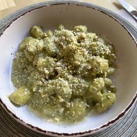 GNOCCHI IN GREEN PESTO WITH ALMONDS AND "PARMESAN”  at Umami Good Food - La Laguna in Tenerife
