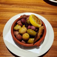 Spanish olives (roasted with laurel and lemon) at Anima Cucina in Bismarck