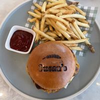 Vegan quinoa burger with French fries   at Susan's Baking Company in Dubai