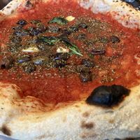 Pizza marinara with olives  at La Compagnia del Luppolo in Parabiago