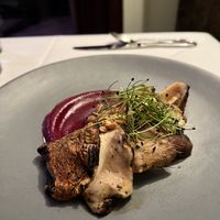 Smoked lobster mushroom on beet romesco sauce.  Mushrooms were amazingly tender and tasty.    at Restaurant Beck in Depoe Bay