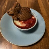 Taiyaki - fish-shaped waffle cake filled with anko swimming in housemade custard and seasonal fruit compote  at Muku Ramen Bar in Belconnen