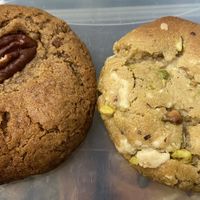 Pecan/maple cookie (not so much flavour) and pistachio/white choco cookie (good). at Saint-Jean Deli in Amsterdam