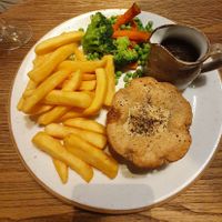 Mushroom & Ale Pie served with herb-roasted carrots, seasonal veg, gravy and oven-baked chips at De Trafford Arms Hotel in Alderley Edge
