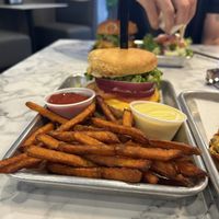 Chicken biscuit with a side of sweet potato fries at Brick City Vegan in Montclair